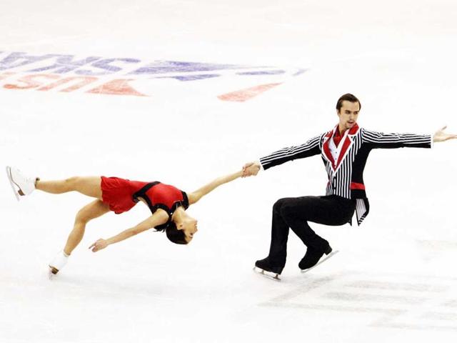 Ksenia Stolbova and Fedor Klimov of Russia compete in the pairs free skate event at the 2013 Skate America figure skating competition at Joe Louis Arena. (Raj Mehta-USA TODAY Sports)