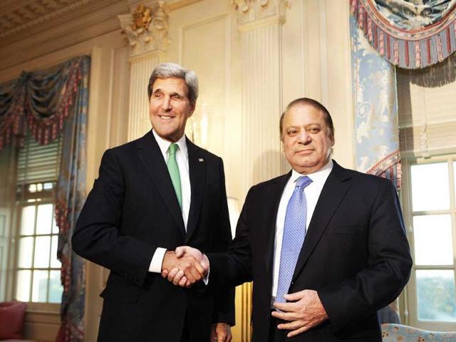 US secretary of state John Kerry shakes hands with Pakistan's Prime Minister Nawaz Sharif before their meeting at the State Department in Washington. (Reuters Photo)