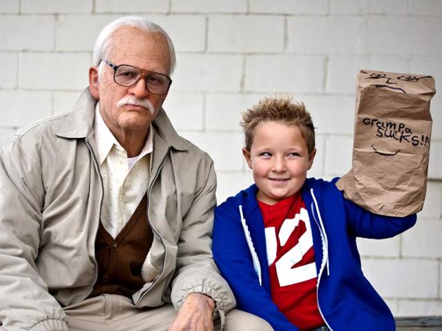 This photo released by Paramount Pictures shows Johnny Knoxville (L) as Irving Zisman and Jackson Nicoll as Billy in Jackass Presents: Bad Grandpa, from Paramount Pictures and MTV Films. (AP Photo)
