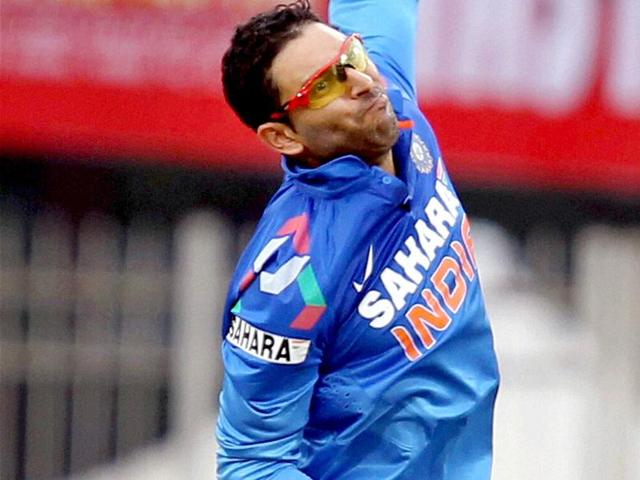 Yuvraj Singh bowls against Australia during the 4th ODI match in Ranchi. (PTI photo)
