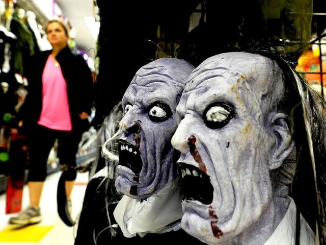 A woman shops for Halloween decorations at a store in Rockville, Maryland. (AFP Photo)