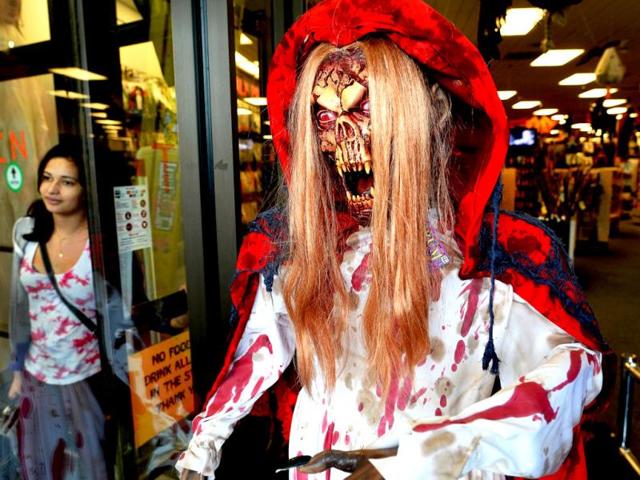 A woman leaves after shopping for Halloween decorations at a store in Rockville, Maryland. (AFP Photo)