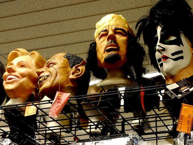 Masks displayed along with other Halloween decorations at a store in Rockville, Maryland. (AFP Photo)