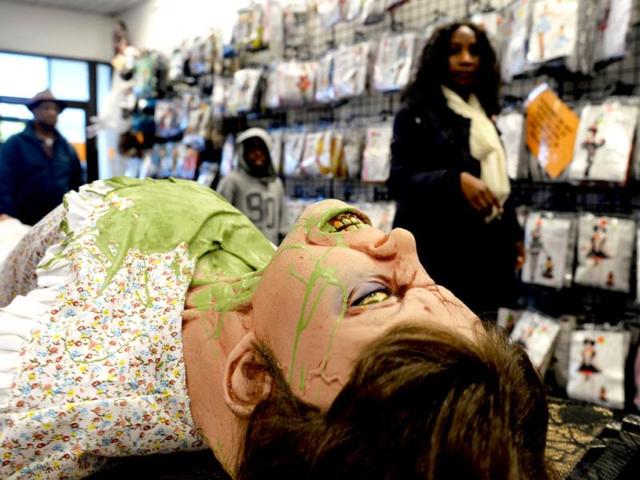 People shop for Halloween decorations at a store in Rockville, Maryland. (AFP Photo)