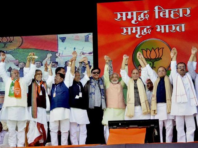 Gujarat chief minister and BJP's PM candidate Narendra Modi, party president Rajnath Singh, senior leader Arun Jaitley along with other state party leaders at the Hunkar rally in Patna. (PTI Photo)