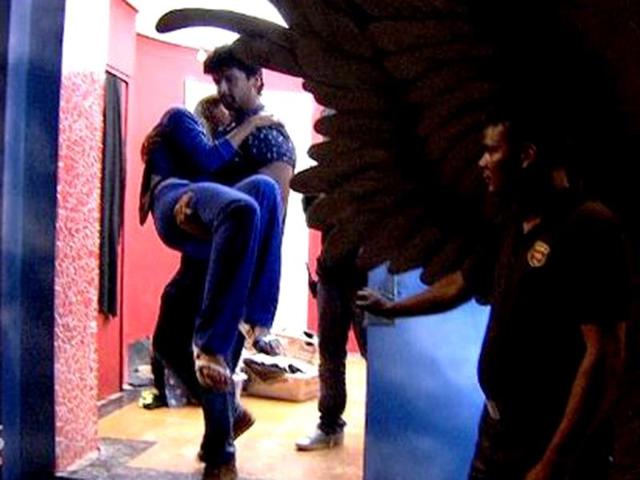 Kushal carried Gauhar as she almost fainted minutes before the exit doors of Bigg Boss were opened. The duo saw a dramatic exit, though Gauhar is now back in the show. Browse through.