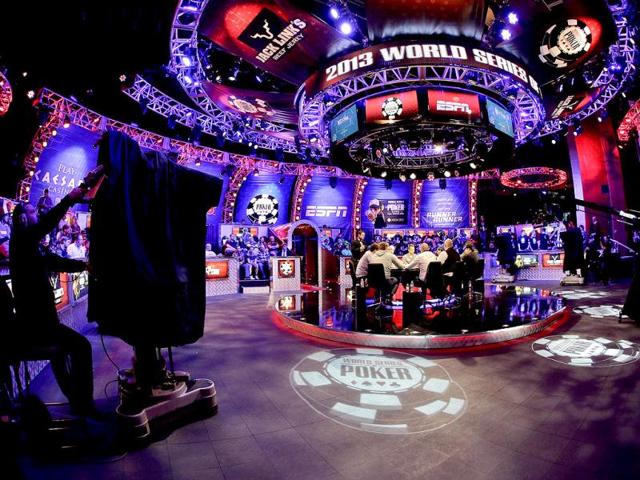 The nine final contestants begin play during the World Series of Poker Final Table in Las Vegas. (AP Photo)