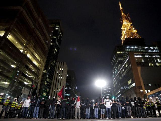 People take part in a demonstration for the Guy Fawkes World Day in Sao Paulo, Brazil. (AFP Photo)
