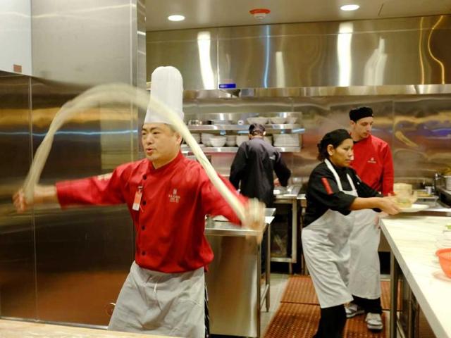 A chef hand pulls noodles in the kitchen of the MY China restaurant at the Graton Resort and Casino in Rohnert Park, California. (AP Photo)