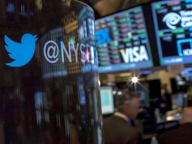 The Twitter logo is displayed on the floor of the New York Stock Exchange a day before the company's IPO. (Reuters photo)
