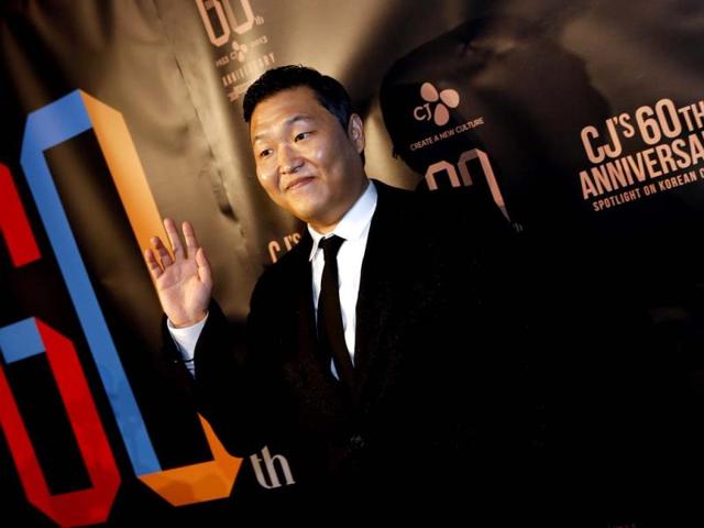 Korean singer PSY poses for photographers as he arrives for the CJ Group 60th Anniversary Spotlight on Korean Cinema event at New York's Museum of Modern Art. (Reuters)