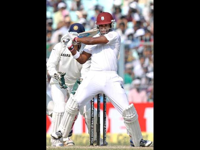 West Indies batsman Kieran Powell plays a shot during third day of the first test match against India at Eden Garden in Kolkata. (PTI Photo)