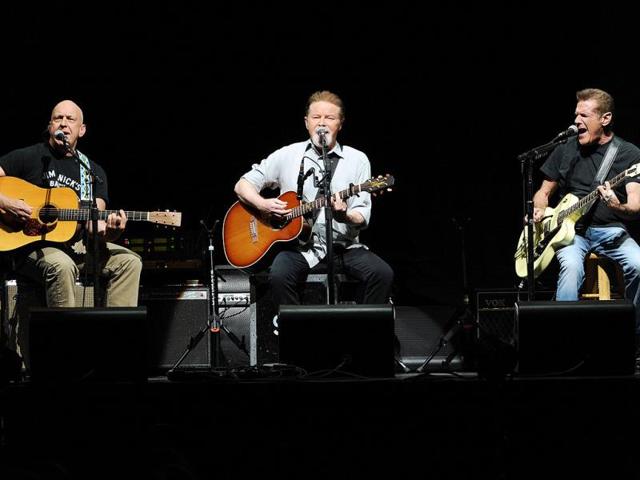 Musicians Bernie Leadon, left, Don Henley and Glenn Frey, right, of the Eagles perform at Madison Square Garden in New York. (AP photo)