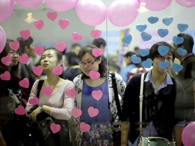 Participants take part in a bachelor's meeting event on during a mass match-making event ahead of Singles Day in Shanghai, China. (AP Photo)
