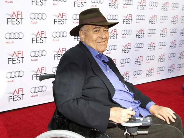 Italian director Bernardo Bertolucci smiles during an interview as he arrives for a gala screening of his film -- The Last Emperor -- in 3D at the AFI Fest 2013 in Hollywood, California. (Reuters photo)
