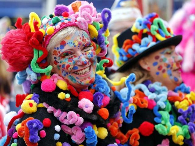 Fools celebrate in the streets of downtown Duesseldorf after the symbolic awakening of the Hoppeditz, the symbol for carnival. (AP Photo)