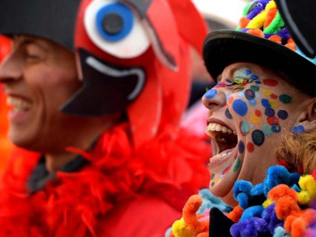 Masqueraded revellers celebrate the start of the carnival season in the western German city of Duesseldorf. (AFP Photo)