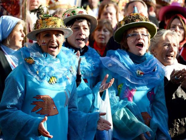 Masqueraded revellers celebrate the start of the carnival season in the western German city of Duesseldorf. (AFP Photo)