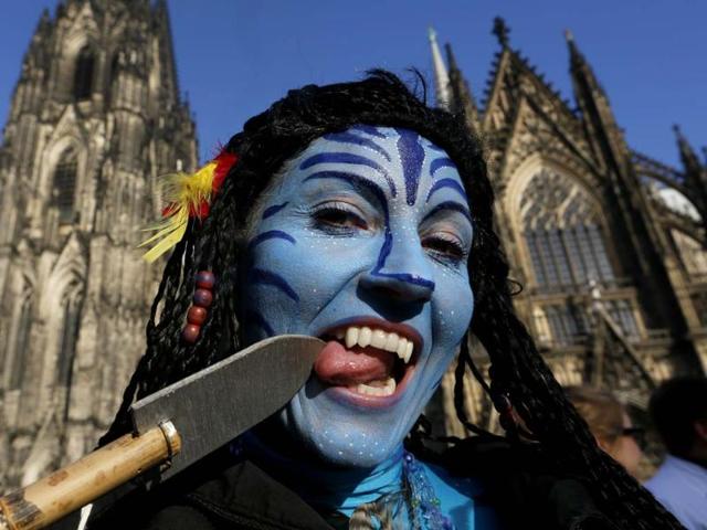 Carnival revellers celebrate the start of the carnival in Cologne. In many parts of Germany people marked the official start of Carnival. (Reuters Photo)