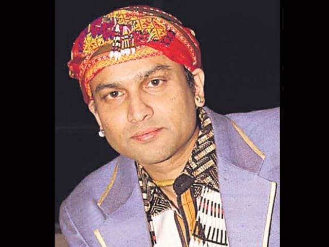 Singer Zubeen Garg sports a northeast head gear.
