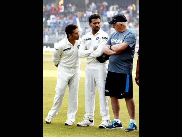 Sachin Tendulkar with Rohit Sharma and coach Duncan Fletcher on his final Test match against West Indies at Wankhede Stadium in Mumbai. (Ajay Aggarwal/ HT photo)