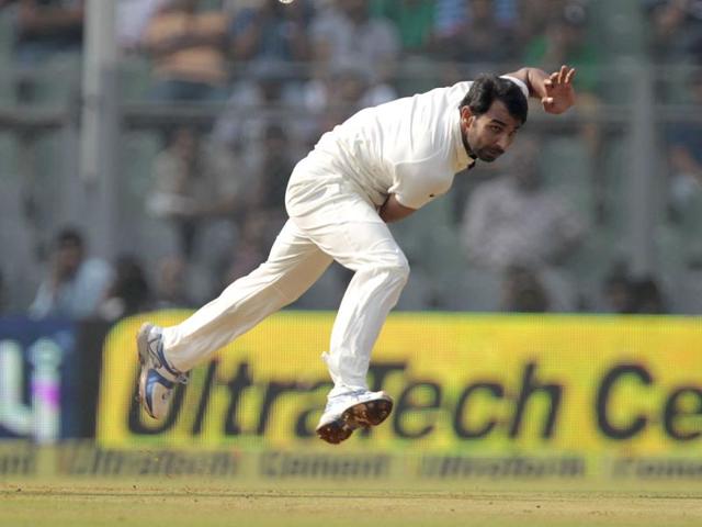 Mohammed Shami blows during 2nd Test match between India and the West Indies at the Wankhede Stadium in Mumbai. (HT Photo/Satish Bate)