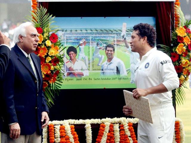 Union minister Kapil Sibal during the release of special postal stamp of Sachin Tendulkar at Wankhede stadium in Mumbai. (PTI/Santosh Hirlekar)