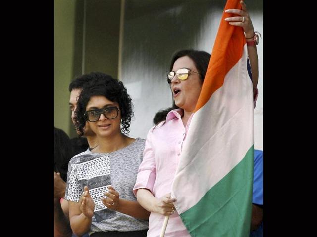 Nita Ambani waves the tricolour at Wankhede on Friday as Kiran Rao watches on.