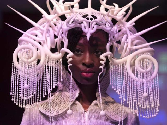 A creation by Joshua Harker printed in 3D by Eos is modelled during the "3D Print Show" exhibition in Paris. (AFP Photo)