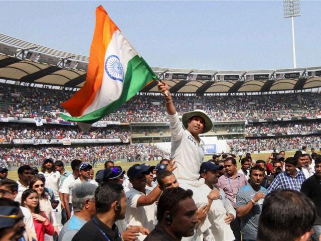 Sachin takes a lap of the ground as his teammates carry him on their shoulders in Mumbai. (PTI Photo)