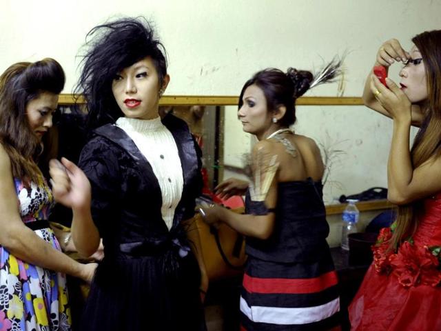 Nepalese transgendered performers put on make up before a show in Kathmandu. (AFP Photo)