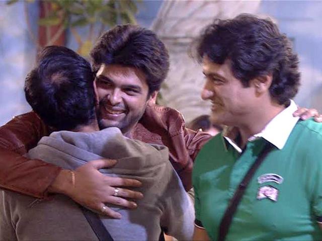 Kushal meets Andy warmly; an elated Armaan looks on.