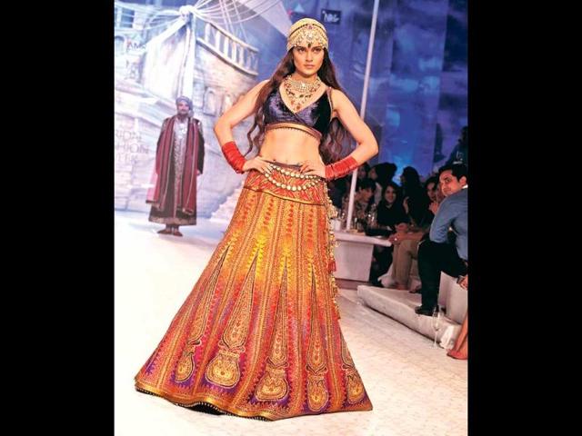 A must-have accessory this season, it is not that difficult to style a turban. Just tone down the other accessories and jazz up the headgear. Kangana Ranaut walks the ramp sporting a turban. 