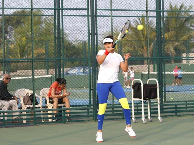 There goes the whipping forehand which has made the strongest players on the tour cry. (Ajay Aggarwal /HT photo)