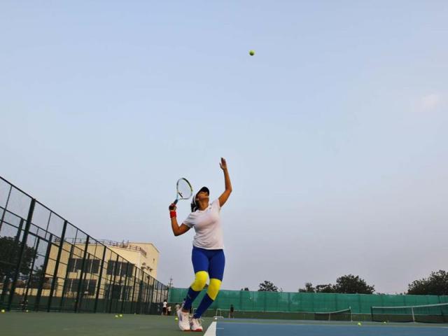 In the newly-opened Sania Mirza Tennis Academy in the outskirts of Hyderabad, the tennis star perfects her serve. (Ajay Aggarwal/HT photo)
