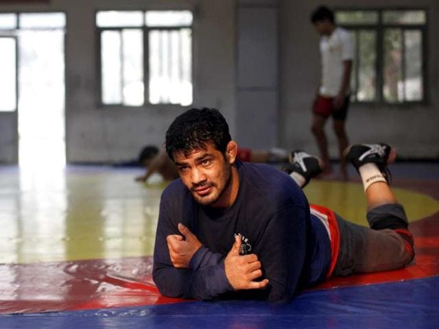 World wrestling champ Sushil Kumar in a pensive mood at the Chhatrasal Stadium in New Delhi. (Ajay Aggarwal/HT photo) World wrestling champ Sushil Kumar in a pensive mood at the Chhatrasal Stadium in New Delhi. (Ajay Aggarwal/HT photo)