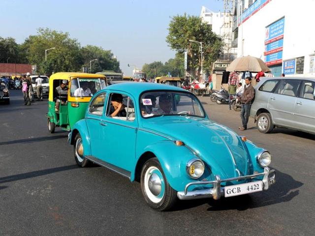 A 1967 Volkswagen Beetle driven by Chandan Ghanshyam Nath is pictured during the Vintage Car Rally in Ahmedabad. (AFP Photo)