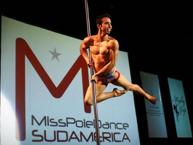 Venezuelan pole dancer Gregoris Garcia performs in the men's category of the Pole Dance South America 2013 competition in Buenos Aires, Argentina.(AP Photo)