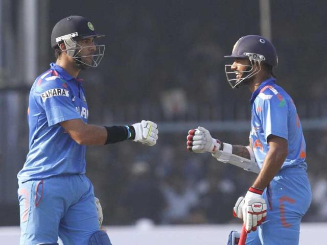 Shikhar Dhawan and Yuvraj Singh in action against West Indies during the 3rd ODI in Green Park Stadium at Kanpur. (Virendra Singh Gosain/ HT photo)