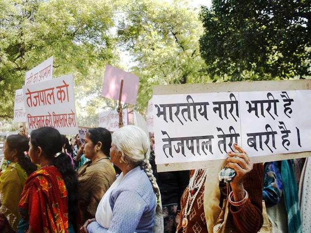 Activists protest against Tehelka magazine’s former-editor Tarun Tejpal at Jantar Mantar in New Delhi. (Firoz/HT photo)