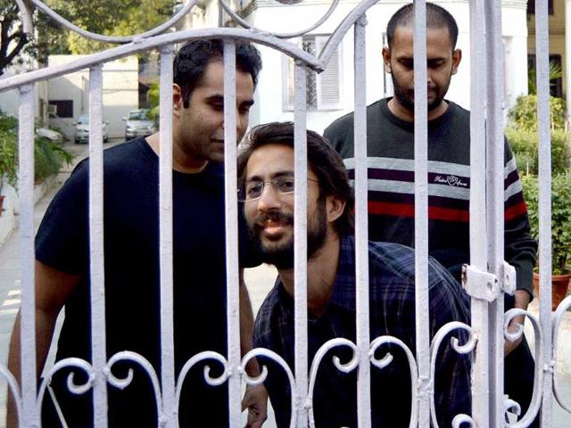 Journalists of Tehelka magazine come out of Goa Sadan after being questioned by Goa police in New Delhi. (PTI photo)