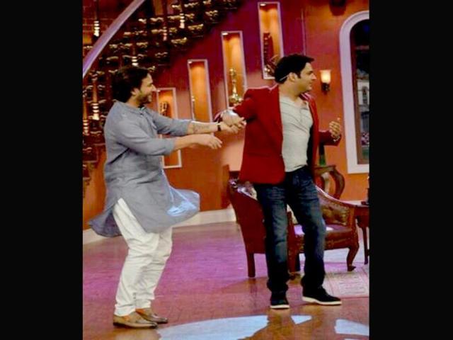 Saif Ali Khan fools around with Kapil Sharma on the sets of his comedy show.