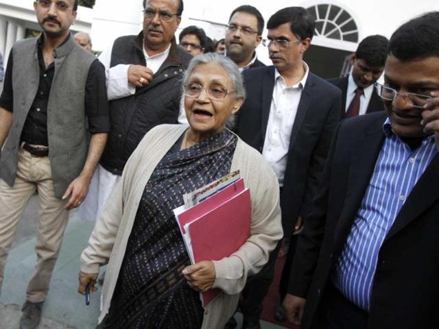 Delhi chief minister Sheila Dikshit going for a press conference at her residence in New Delhi. (Virendra Singh Gosain/HT)