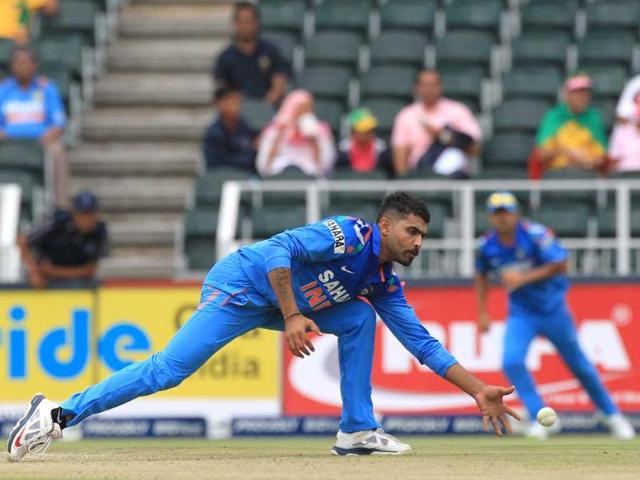 India's Ravindra Jadeja, attempts to field off his own bowling during the 1st ODI against South Africa at the Wanderers Stadium. (AP Photo)