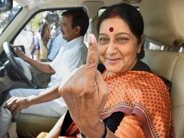 BJP leader Sushma Swaraj leaves after casting her vote for Assembly elections in Bhopal, Madhya Pradesh. (PTI)