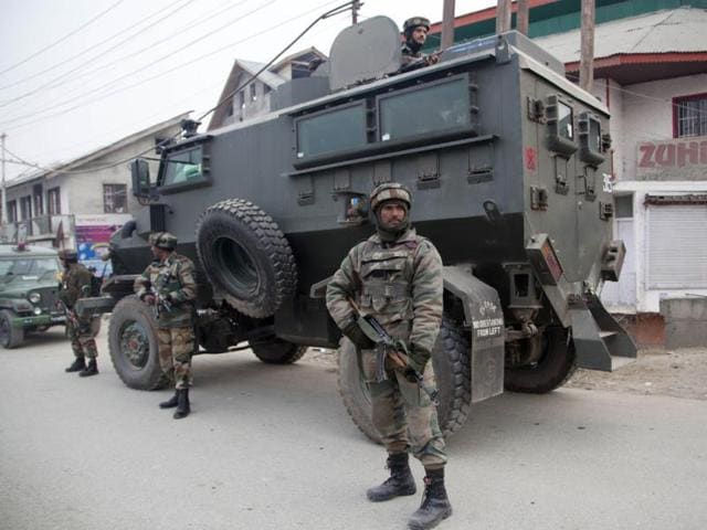 Indian-army-soldiers-stand-guard-near-the-site-of-a-shootout-on-the-outskirts-of-Srinagar-AP-Photo