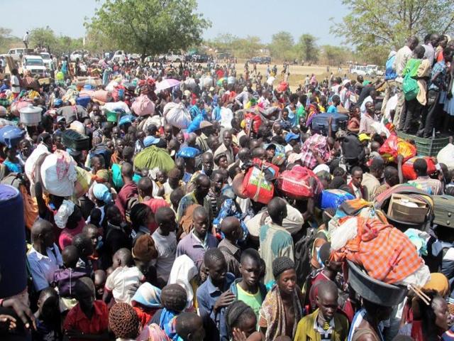 A-handout-photo-from-UNMISS-showing-civilians-gathered-outside-the-UNMISS-compound-in-Bor-AFP-Photo A-handout-photo-from-UNMISS-showing-civilians-gathered-outside-the-UNMISS-compound-in-Bor-AFP-Photo
