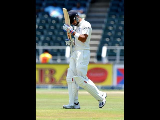 Virat Kohli walks off the field after being dismissed on the fourth day of the first Test at the Wanderers Stadium in Johannesburg. (AFP Photo)