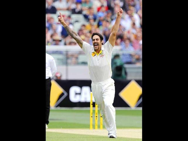 Australia's Mitchell Johnson celebrates the wicket of England's Tim Bresnan during the Fourth Ashes Test at the Melbourne Cricket Ground in Melbourne, Australia. (AP Photo)