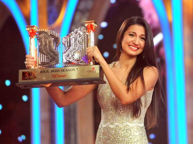 Gauhar Khan poses with her trophy.